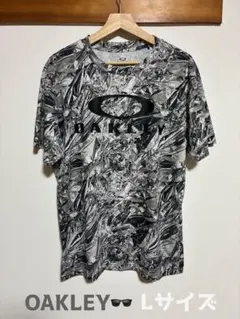 ♦︎OAKLEY オークリー 半袖 Tシャツ 総柄 ジム スポーツウェアのサムネイル
