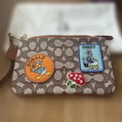 ☆新品未使用☆COACH ドナルド・ダック デイジー ポーチ - メルカリ