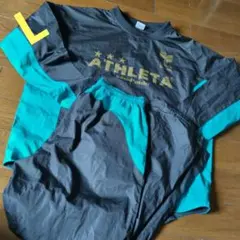 ATHLETA ピステ・ウィンドブレーカー　上下 L　ブラック・ターコイズ