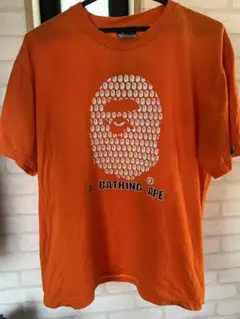 A BATHING APE エイプヘッド 総柄 Tシャツ オレンジ