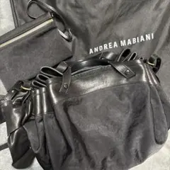 Andrea Mabiani ポシェット　シルバー ANDREA MABIANI パープルゴールド色パイソン 巾着バッグ新宿伊勢丹