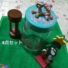 ディズニー ダッフィーとシェリーメイガラス瓶 空き瓶 ツリー 砂時計 緑のタオル