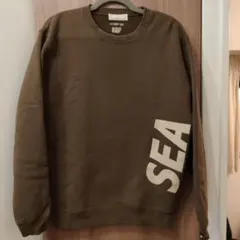 WIND AND SEA Sea 25L/S Tee ブラウンカーキ/オレンジ - メルカリ