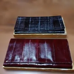 黒と赤の長財布2点セット　ウナギの革