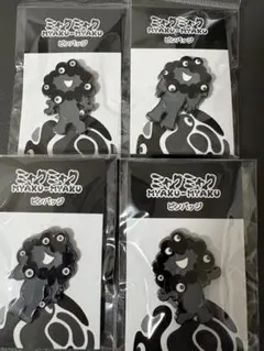サンリオ ミャクミャク モノクロ金ピンバッジ 4つセット - メルカリ