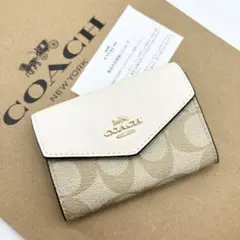【COACH☆新品】フラップ カード ケース・シグネチャー キャンバス！名刺入れ