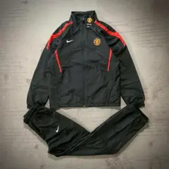 新品 NIKE マンチェスターユナイテッド ナイロンセットアップ キッズ L