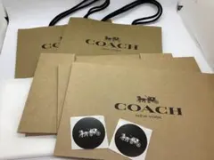 COACH ショップ袋 2枚と、長財布用箱、ティシュ、シールセット