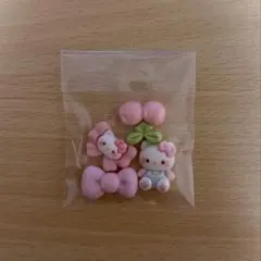 ハローキティ　キティ　キティちゃん　デコパーツ　ピンク　リボン　さくらんぼのサムネイル