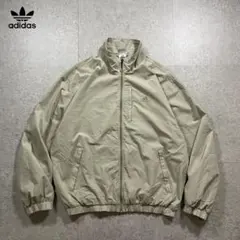 adidas 00sナイロンジャケット ベージュ刺繍ロゴ Y2K テック系L古着