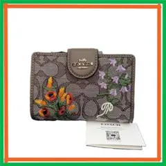 COACH直営店コーチシグネチャー 刺繡フローラルスムース ミディアム二折り財布のサムネイル