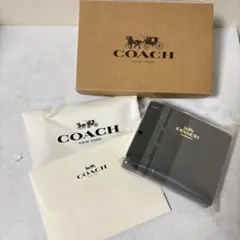 新品 COACH コーチ 二つ折り財布 ブラック シンプル レディース メンズ