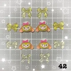 ネイルパーツ　ダッフィーフレンズ　ディズニー　クッキーアン　黄色　リボン