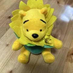 クマのプーさんひまわりぬいぐるみ - メルカリ