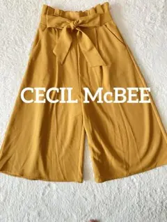 CECIL McBEEフレアパンツ黄色
