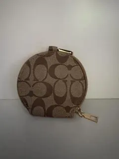COACH円形ベージュコインケース
