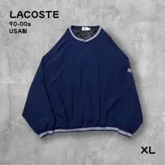 LACOSTE USA製ナイロンプルオーバーXLクロスネック短丈ワイド袖ロゴ紺