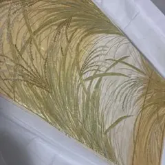 金色の草花模様の名古屋帯