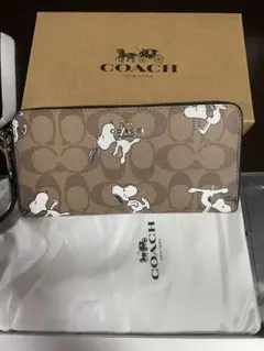 新品 保存袋カード付きCOACH コーチ スヌーピー 長財布 シグネチャー