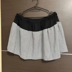 トップスの裾の延長に