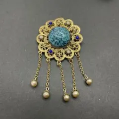 ターコイズ装飾の花形 ブローチ
