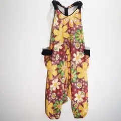 シワ加工コットン　サロペットデザインのサルエルパンツ　オレンジ系の花柄　小豆色系