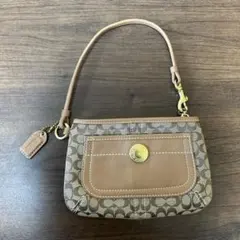 COACH シグネチャー ターンロック アクセサリーポーチ ピンクレザー