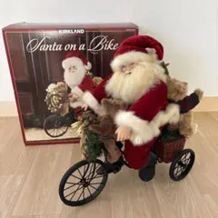サンタクロース　置物　自転車　Santa on a bike KIRKLAND