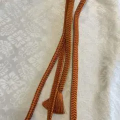 オレンジ 編み込み 帯締め 房付き