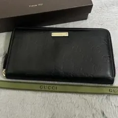 GUCCI グッチ　長財布　ラウンドファスナー　メタルロゴ　ブラック　GG