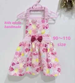こ専用キッズエプロン ピンク 花柄 リボン付きお花畑のちょうちょリボン柄　ピンク