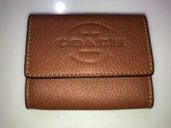 新品コーチ小銭入れ財布ナチュラルスムースレザーコインパスF24652サドル茶色系