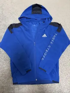 adidas フード付きウィンドブレーカー ブルーのサムネイル
