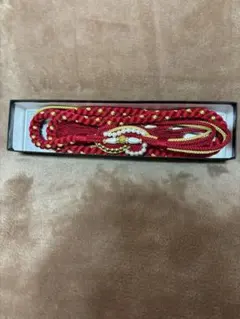 赤と金の編み込み帯締め