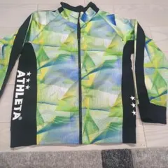ATHLETA 幾何学模様 ウィンドブレーカー