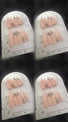 ピンクネイルチップ クロス・リボンデザイン
