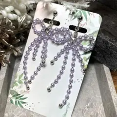 【リボン】パープル系フェミニンパール　シルバーイヤリング　ピアスに変更可能