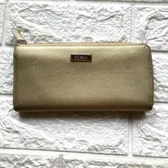 FURLA 長財布 ゴールド ラウンドファスナーのサムネイル