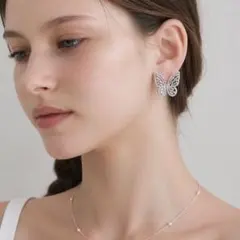 SWAROVSKI スワロフスキー 蝶モチーフ ストーン付きオープンバングル 