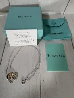 美品】TIFFANY&Co.ツイストリボンコンビネックレス SV925×K18 - メルカリ