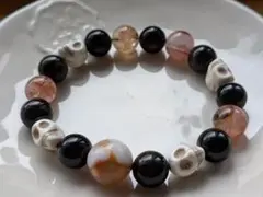 桜瑪瑙・黒曜石・ライモナイトインクォーツ・ハウライトスカルのブレスレット