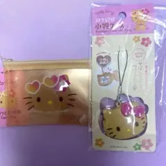 フラットポーチ　ストラップ付き小物入れ　日焼け キティ セリア