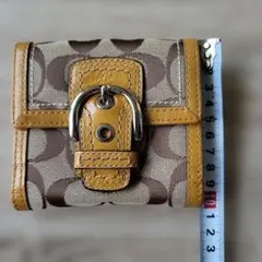 COACH 二つ折り財布 シグネチャー ベージュのサムネイル