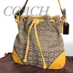 COACH コーチ 巾着 ショルダーバッグ レザー キャンバス シグネチャー