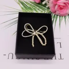 スワロフスキージルコンリボン花ブローチ真珠コサージュ結婚式入学式卒業式記念日