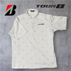 ブリヂストン TOUR B メンズM 美品 ホワイト 総柄 ゴルフウェア 半袖のサムネイル