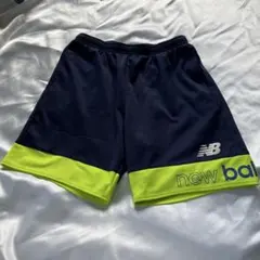 new balance ネイビー/ライム サッカーパンツ