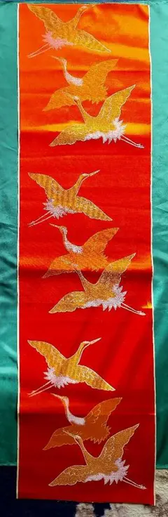 鶴刺繍のオレンジ金蘭生地はぎれ