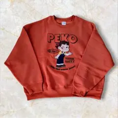 ペコちゃんPEKOキャラクタープリント裏起毛オレンジトレーナー【L Size】