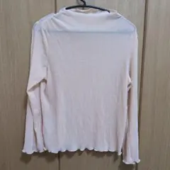 淡いオレンジの長袖トップス　シアー